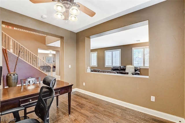 6409 Sea Swallow St, North Las Vegas, NV 89084 - office area featuring ceiling fan, wood finished floors, and baseboards