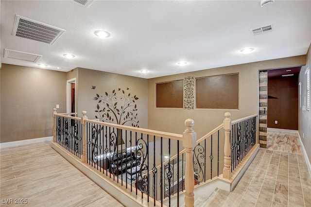 6409 Sea Swallow St, North Las Vegas, NV 89084 - hall featuring an upstairs landing, recessed lighting, baseboards, wood finished floors, and attic access