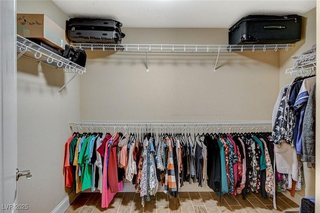 6409 Sea Swallow St, North Las Vegas, NV 89084 - walk in closet featuring wood finished floors