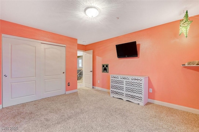 6409 Sea Swallow St, North Las Vegas, NV 89084 - unfurnished bedroom featuring carpet, a closet, and baseboards