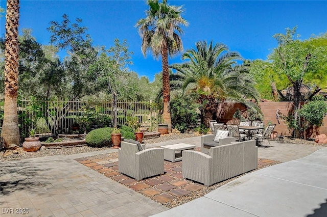 6409 Sea Swallow St, North Las Vegas, NV 89084 - view of patio with outdoor lounge area and outdoor dining area