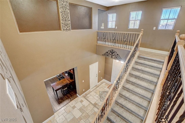 6409 Sea Swallow St, North Las Vegas, NV 89084 - staircase featuring baseboards