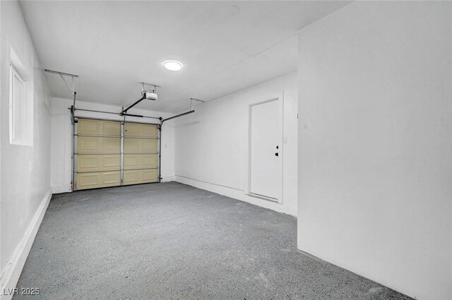 2521 Richfield Blvd, Las Vegas, NV 89102 - garage with a garage door opener and baseboards