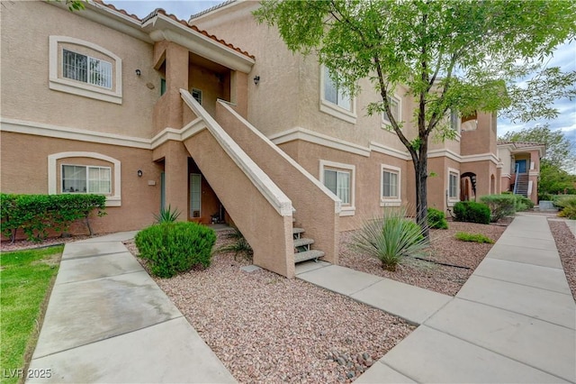 10525 Pine Glen Ave Unit 206, Las Vegas, NV 89144 - view of building exterior featuring stairs