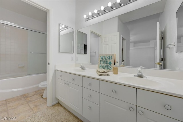 10525 Pine Glen Ave Unit 206, Las Vegas, NV 89144 - full bathroom with toilet, double vanity, and shower / bath combination with glass door