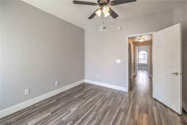 541 Indian Bluff St Unit 201, Las Vegas, NV 89145 - spare room featuring a ceiling fan, dark wood-type flooring, baseboards, and a smoke detector