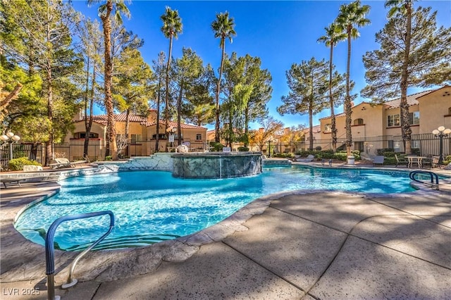 541 Indian Bluff St Unit 201, Las Vegas, NV 89145 - community pool featuring fence, a residential view, and a patio area