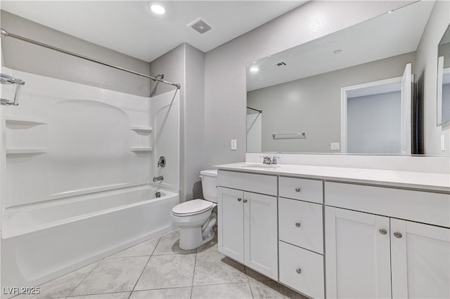 bathroom featuring toilet, vanity, bathtub / shower combination, tile patterned floors, and recessed lighting
