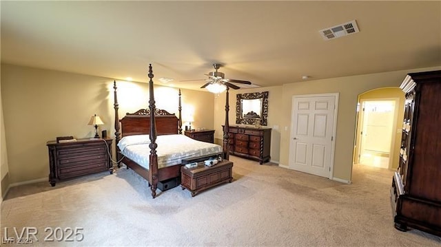 6339 Sharp Rock Ct, Las Vegas, NV 89139 - bedroom featuring light colored carpet, baseboards, and arched walkways
