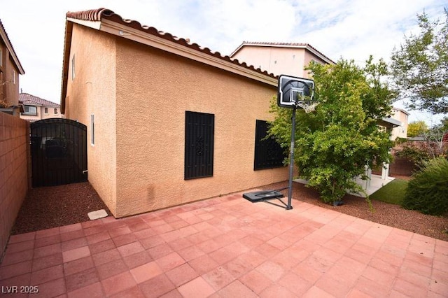 6339 Sharp Rock Ct, Las Vegas, NV 89139 - view of patio / terrace featuring a gate and fence