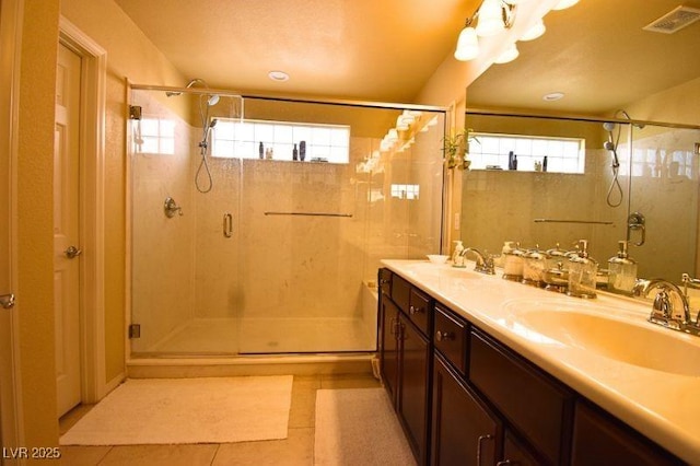 6339 Sharp Rock Ct, Las Vegas, NV 89139 - full bath featuring tile patterned flooring, a shower stall, and double vanity