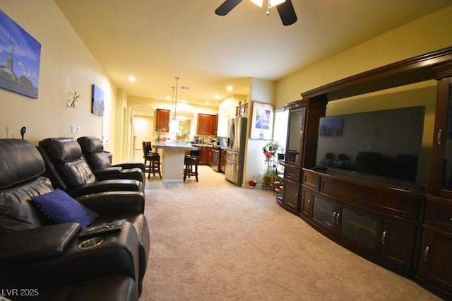 6339 Sharp Rock Ct, Las Vegas, NV 89139 - living area featuring light carpet, a ceiling fan, and recessed lighting