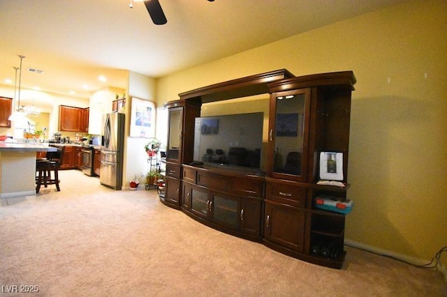 6339 Sharp Rock Ct, Las Vegas, NV 89139 - living room featuring light carpet and ceiling fan
