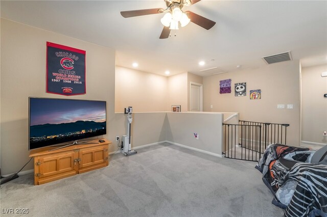 162 Sand Lake St, Henderson, NV 89074 - living area featuring light carpet, baseboards, a ceiling fan, and recessed lighting