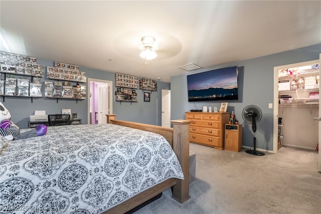162 Sand Lake St, Henderson, NV 89074 - carpeted bedroom with a spacious closet, baseboards, and ceiling fan