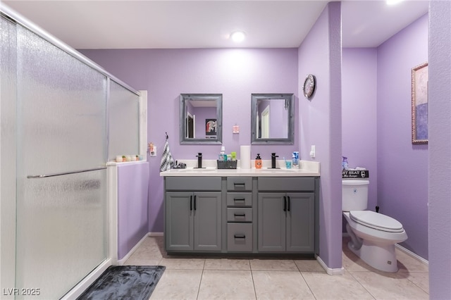162 Sand Lake St, Henderson, NV 89074 - bathroom featuring toilet, a shower stall, tile patterned flooring, and double vanity