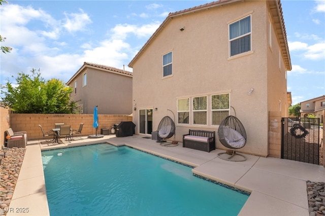 162 Sand Lake St, Henderson, NV 89074 - view of pool with a patio area, fence, and a gate