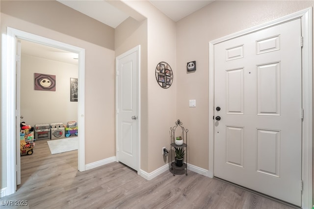 162 Sand Lake St, Henderson, NV 89074 - foyer with light wood-style floors and baseboards