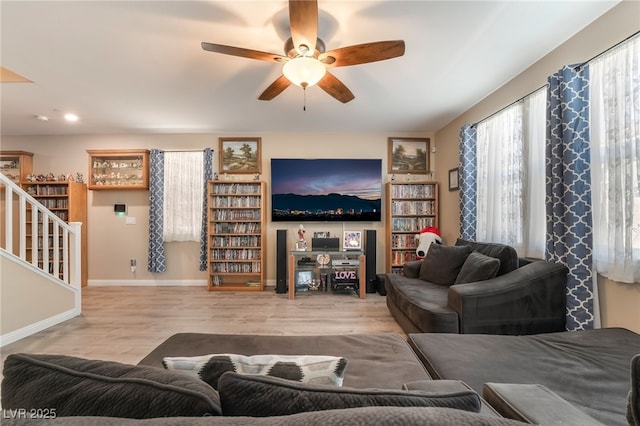 162 Sand Lake St, Henderson, NV 89074 - living room featuring ceiling fan, stairs, wood finished floors, baseboards, and recessed lighting