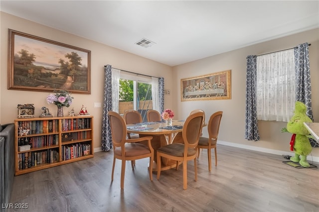 162 Sand Lake St, Henderson, NV 89074 - dining area with wood finished floors and baseboards