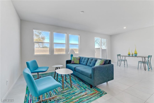 7256 Saxby Ave, Las Vegas, NV 89113 - living room with baseboards, light tile patterned floors, and recessed lighting