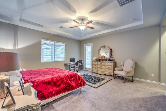 9760 Arch Canyon Ct, Las Vegas, NV 89149 - bedroom with a tray ceiling, carpet flooring, a ceiling fan, and baseboards