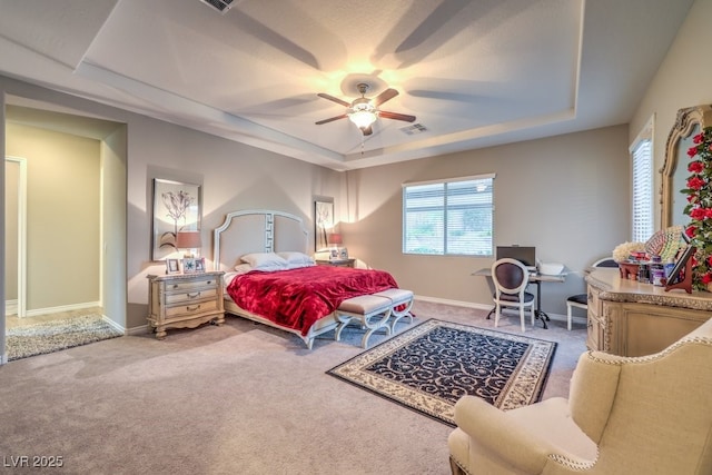 9760 Arch Canyon Ct, Las Vegas, NV 89149 - carpeted bedroom with a tray ceiling, baseboards, and ceiling fan