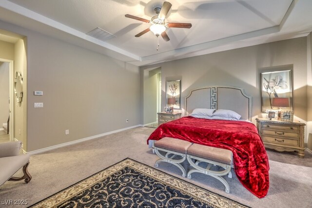 9760 Arch Canyon Ct, Las Vegas, NV 89149 - bedroom with carpet, baseboards, a raised ceiling, and a ceiling fan