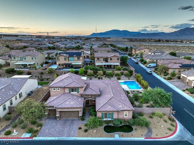 9760 Arch Canyon Ct, Las Vegas, NV 89149 - aerial view of residential area with mountains and a pool area