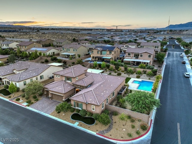 9760 Arch Canyon Ct, Las Vegas, NV 89149 - aerial view at dusk of a residential view and a mountain view