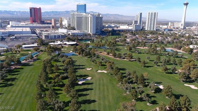 778 Vegas Valley Dr, Las Vegas, NV 89109 - view of urban area featuring a mountain backdrop and a golf course