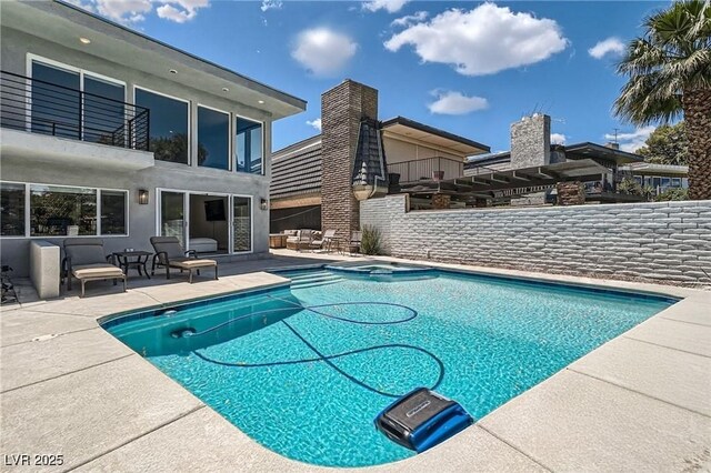 778 Vegas Valley Dr, Las Vegas, NV 89109 - view of pool featuring a patio area and a pool with connected hot tub