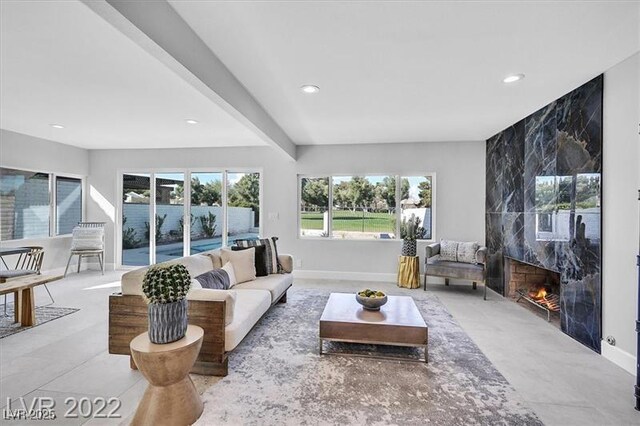 778 Vegas Valley Dr, Las Vegas, NV 89109 - living area featuring recessed lighting, a high end fireplace, and baseboards
