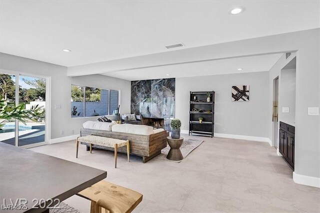 778 Vegas Valley Dr, Las Vegas, NV 89109 - living room featuring baseboards and recessed lighting