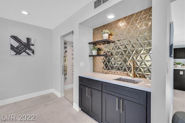 778 Vegas Valley Dr, Las Vegas, NV 89109 - indoor wet bar with baseboards, decorative backsplash, and recessed lighting