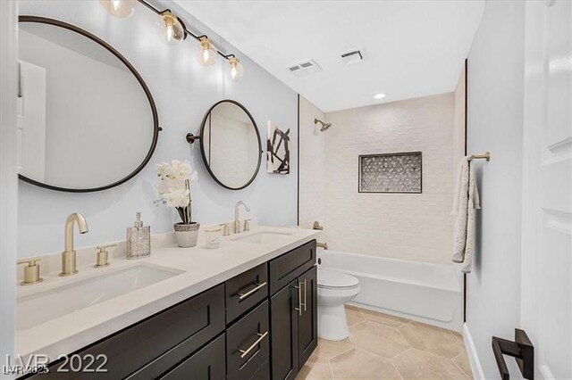 778 Vegas Valley Dr, Las Vegas, NV 89109 - bathroom featuring toilet, tub / shower combination, tile patterned flooring, and double vanity