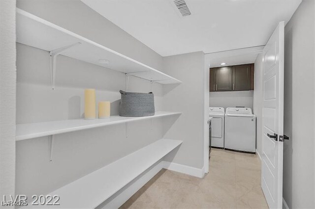 778 Vegas Valley Dr, Las Vegas, NV 89109 - storage area featuring separate washer and dryer