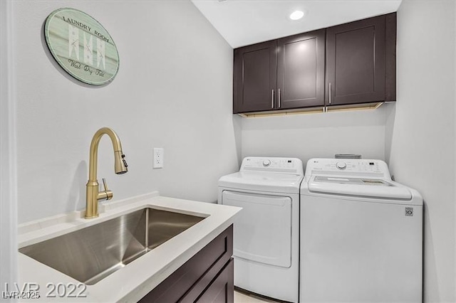 778 Vegas Valley Dr, Las Vegas, NV 89109 - clothes washing area with cabinet space, washer and clothes dryer, and recessed lighting