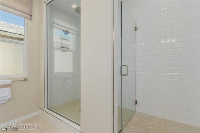 10316 Apefly St, Las Vegas, NV 89141 - bathroom featuring a shower stall and baseboards