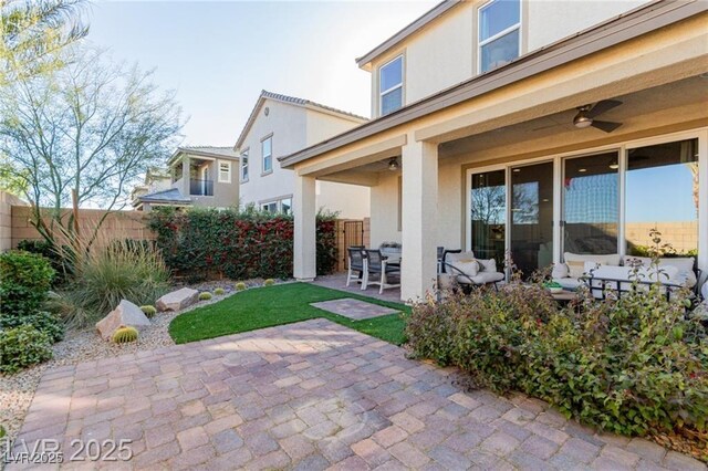 10316 Apefly St, Las Vegas, NV 89141 - view of patio with ceiling fan and fence
