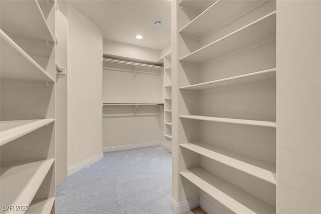7668 Friendly Breeze Ct, Las Vegas, NV 89123 - walk in closet featuring carpet floors