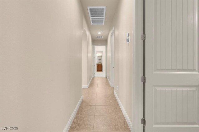7668 Friendly Breeze Ct, Las Vegas, NV 89123 - corridor featuring light tile patterned floors and baseboards