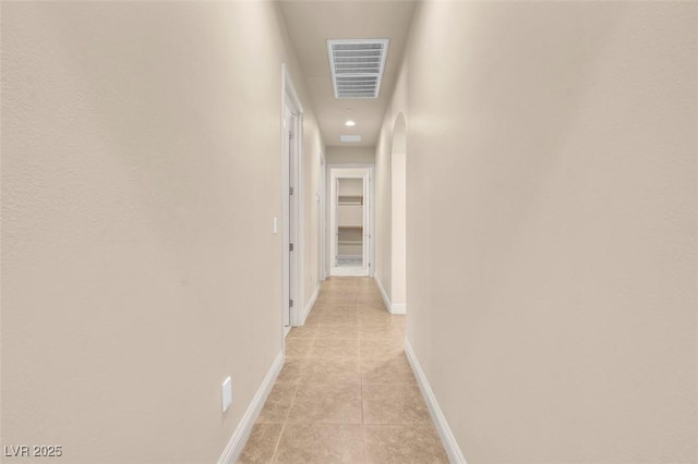 7668 Friendly Breeze Ct, Las Vegas, NV 89123 - corridor with light tile patterned flooring and baseboards