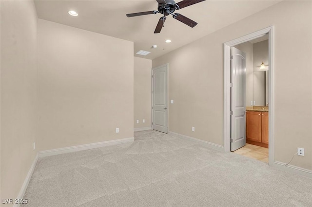 7668 Friendly Breeze Ct, Las Vegas, NV 89123 - unfurnished bedroom with light colored carpet, recessed lighting, baseboards, and ensuite bath