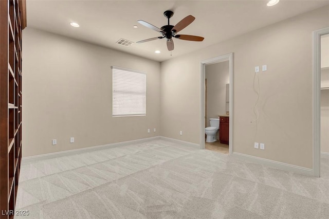 7668 Friendly Breeze Ct, Las Vegas, NV 89123 - unfurnished bedroom featuring light colored carpet, recessed lighting, ensuite bathroom, baseboards, and ceiling fan