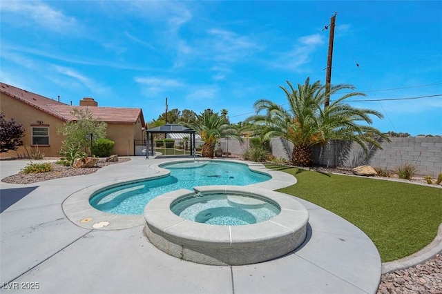 7668 Friendly Breeze Ct, Las Vegas, NV 89123 - view of swimming pool with a gazebo and a pool with connected hot tub