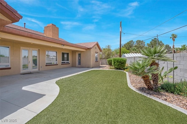 7668 Friendly Breeze Ct, Las Vegas, NV 89123 - view of yard with french doors and a patio