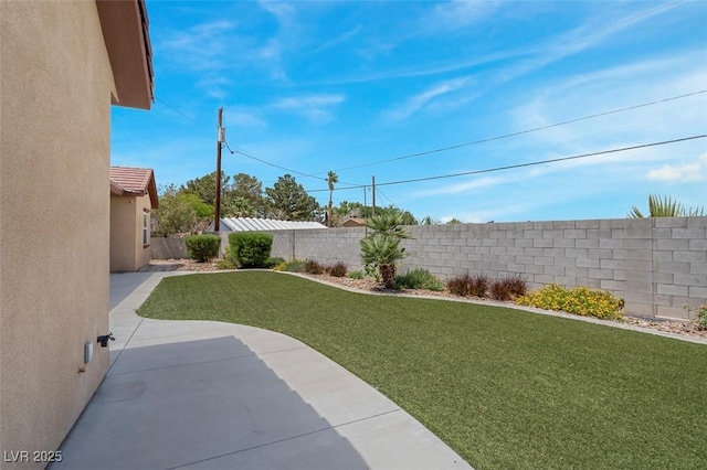 7668 Friendly Breeze Ct, Las Vegas, NV 89123 - view of yard featuring a patio area