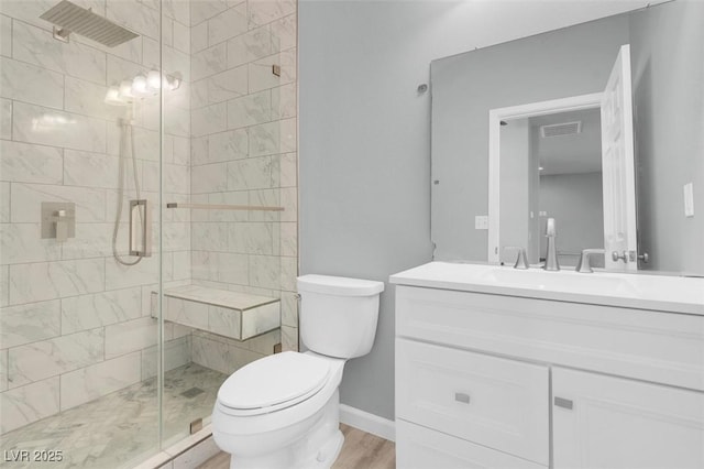 7668 Friendly Breeze Ct, Las Vegas, NV 89123 - bathroom with toilet, vanity, a stall shower, and wood finished floors