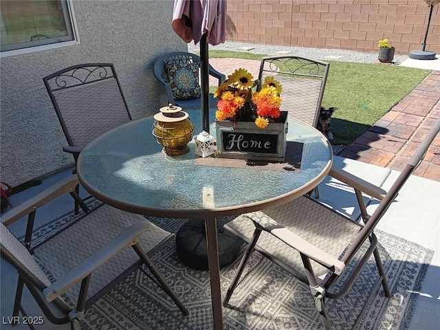 3862 E Summit Ave, Pahrump, NV 89061 - balcony with outdoor dining space and a patio area